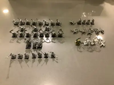 42 vintage fantasy Warhammer figures ranging from the years 1991-1999. Group on the left are unpaint...