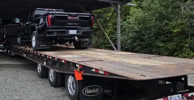 9' wide, 40" deck height 55 ton Sliding Axle 6 pop up rollers 30,000 lb winch 17.5" low profile tire...