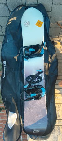 Snowboard, bindings and bag