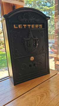 Vintage cast Iron mailbox