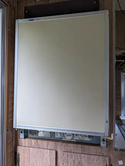 Camper fridge, stove, water tank with pump and nice sink and taps. All runs on propane it looks like...