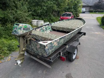 Has an EVA foam covered casting deck made of spar coated ply. Has a 2 stroke 6hp johnson on the back...