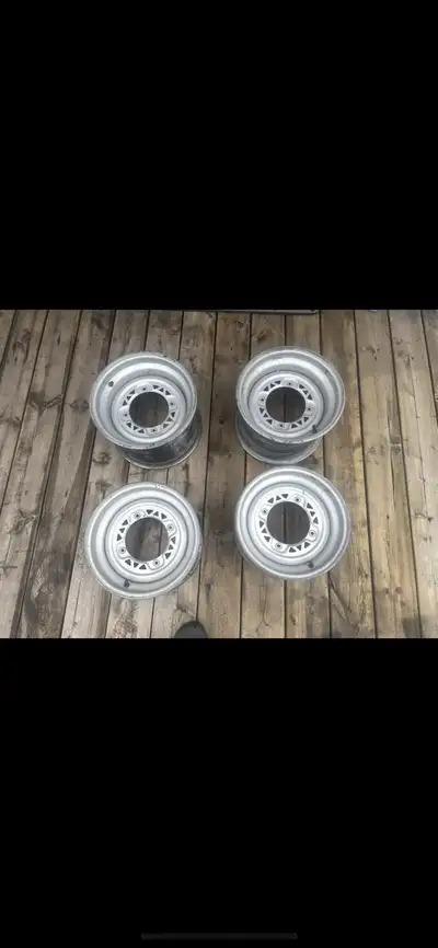 4 12” stock steel rims Polaris sportsman 500 front and rear, View more