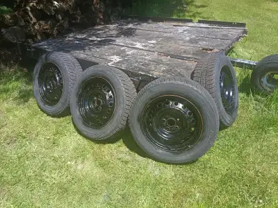 16 inch Toyota steel rims with 205/65/R16 Bridgestone Blizzak winter tires with some tread left. Fit...