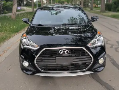 Sporty, fuel-efficient, and fun to drive – selling a well-maintained 2016 Hyundai Veloster Turbo wit...