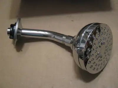 Brand New Moen 4-Setting Showerhead, complete as shown. Bright Chrome finish. Never installed. { I o...