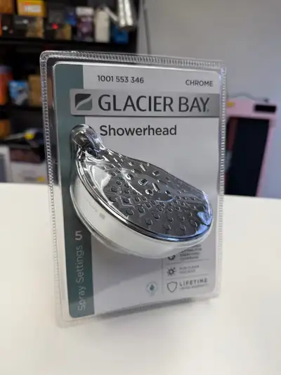 Selling a brand new Glacier Bay showerhead in chrome finish. It has 5 spray settings for a customize...