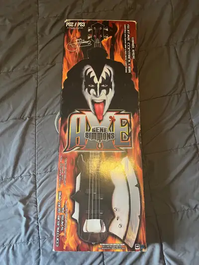 Selling my used Kiss Gene Simmons PS2/PS3 Guitar for use with Guitar Hero or Rockband. Everything wo...