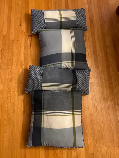 Four throw pillows, View more