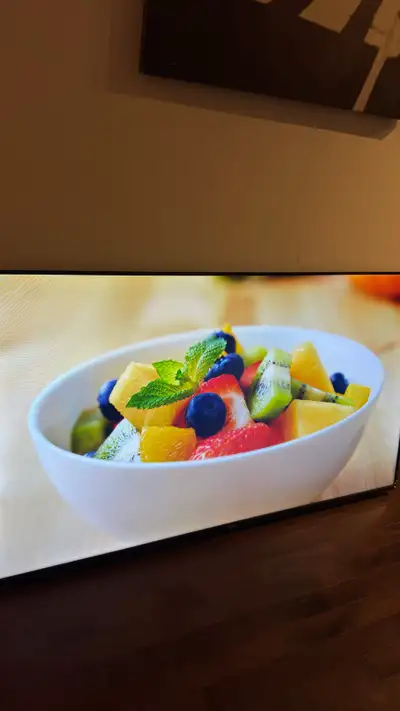 55” Roku 4K QLED Smart TV + FITUEYES Stand (Used 1 Day)”, View more