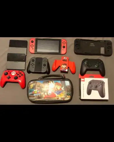 Nintendo switch lot with lots of goodies, View more