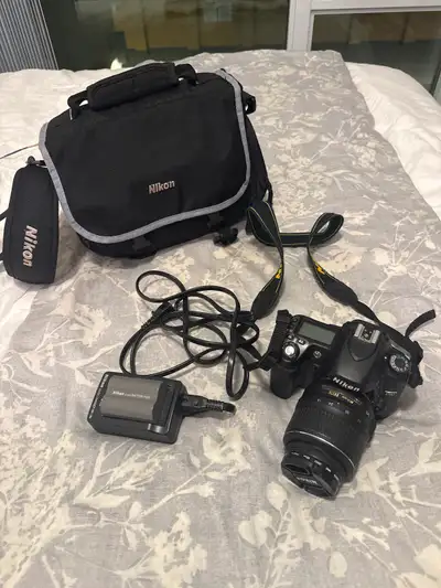 Nikon D80 with additional battery and  with 18-55mm lens, View more