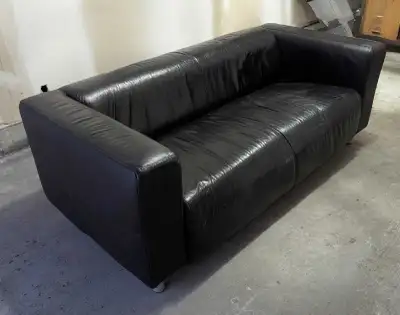 Priced to sell quickly - Black leather couch, View more