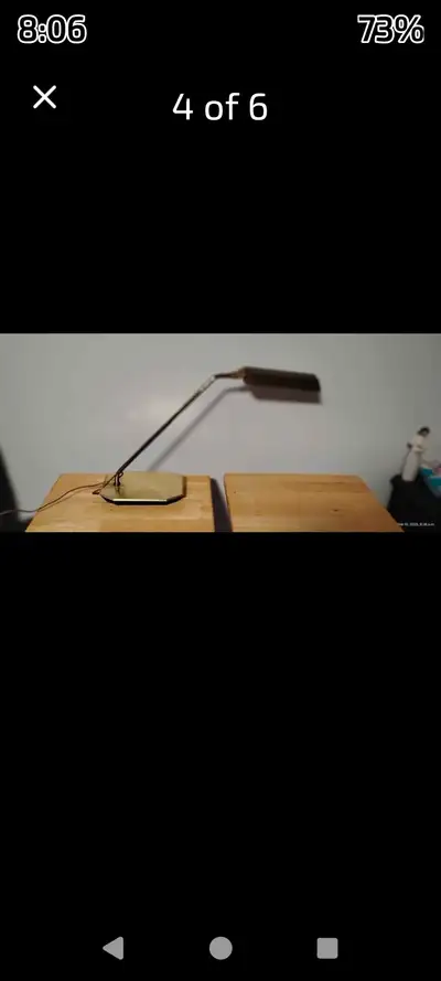 Illuminate your workspace with this vintage Bosch & Loch brass desk lamp. Its adjustable gooseneck d...