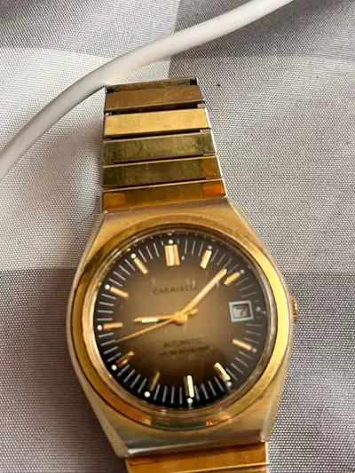 gold Nixon watxh, View more