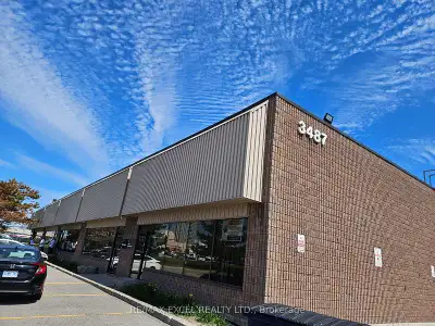 busy intersection industrial space for lease net rent=$17.50/psf+TMI is $6.32/psf one drive in door...