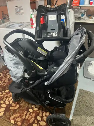 Evenflo Folio 3 stroll and jog travel system. Includes quick fold stroller with litemax indant car s...