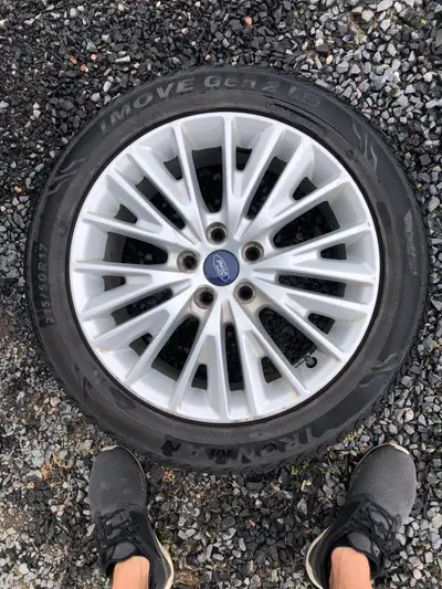 Three tires and three original rims from 2018 Ford Focus Titanium Tires still have life into them bu...
