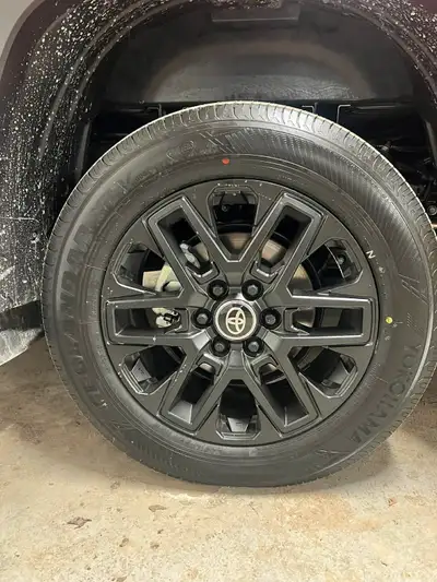 Set of 4 OEM 20” wheels and tires from a 2025 Toyota Tundra Limited Nightshade. Factory black Nights...