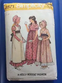 Several vintage McCall's and Simplicity Cutting Sewing Patterns