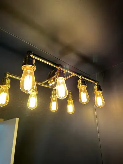 Bathroom sconce with Edison bulbs