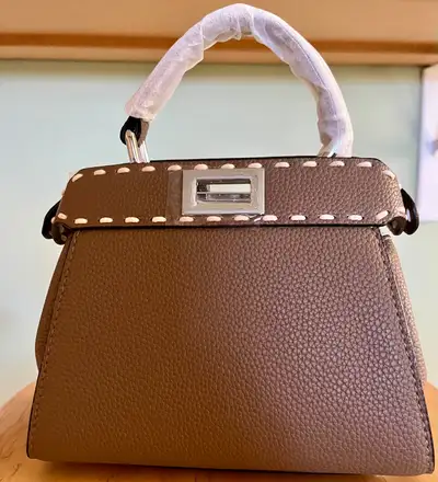 Brand New Leather Satchel Bag Condition: Brand New with dust bag Colour: light brown Material: leath...