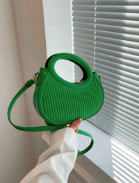 Green curved bag