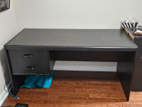 Dark brown desk with 2 drawers.