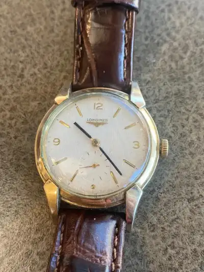 Vintage Longines watch is in good condition. Watch is keeping excellent time and all functions are w...