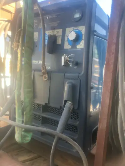 Miller Bobcat 250 welder with cables. 90 hours.