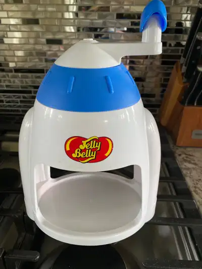 Jelly Belly Ice Shaver machine . Comes with 2 bowls , snow cone cups and straws