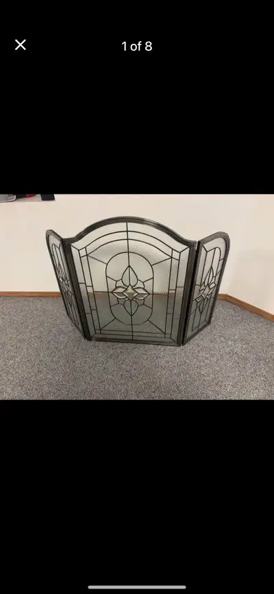 I am selling a Stained Screen Fire Place. Used like new. Contact 7805187061.
