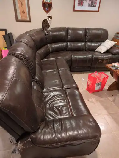Free sectional. No longer have room for it. Cats have damaged a few spots (see pictures). 2 recliner...