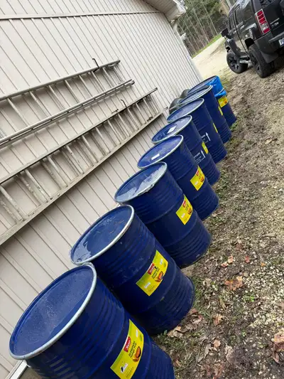 These dark blue 55 gallon steel barrels previously contained Alphonso Mango Pulp and are food grade,...