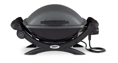Weber Q1400 electric bbq Perfect for condo balconies Slightly used. Clean New would cost $440 + taxe...