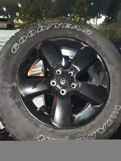 Set of four ram 1500 rims and tires, stock rims for a 2023 ram 1500 classic/4th gen rams. Tires are...