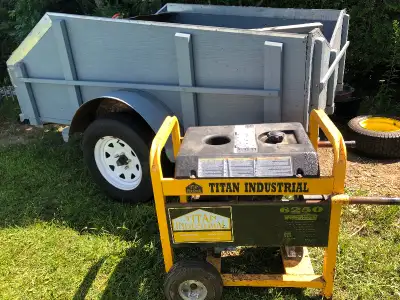 10 hp generator gasoline powered. 120 volt plugs and 220v receptacle, used once. Titan INDUSTRIAL mo...