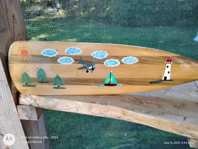 Decorative paddle or use it for your canoe. It has Marine urethan two coats. Or jut put it in your c...