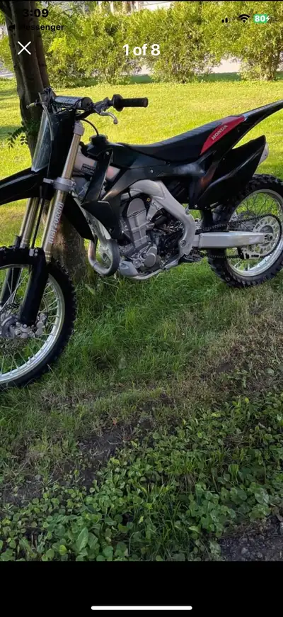 I am selling my Honda CRF450R, a high-performance dirt bike designed for motocross and off-road adve...