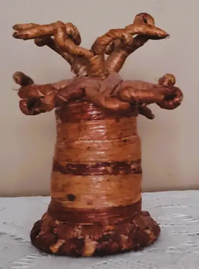Handcrafted Baobab tree made in Africa dimensions-Height 10cm. Diameter at top 8cm. Diameter at bott...