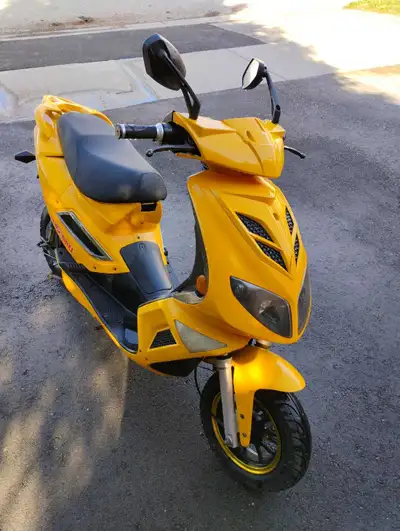 Electric Honda Tevbikes with charger.60 v battery.