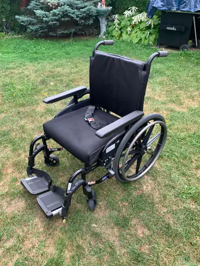 wheel Chair 21 inch seat folds very easy in new condition $100, View more