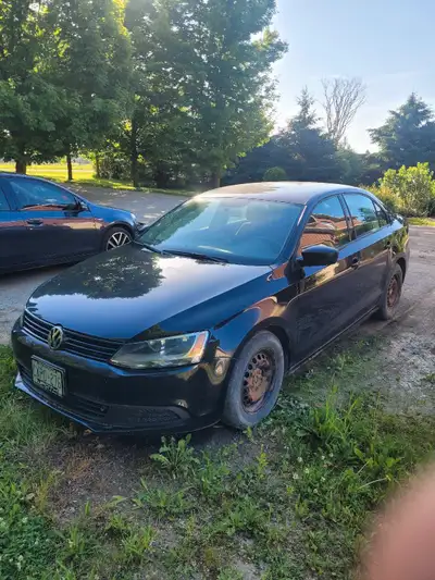 This 2011 VW Jetta was my commuter car up until a month ago. It has been well-maintained by a VW mec...