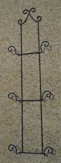 Vertical wrought metal hanging rack ornament