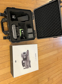 Mavic 2 Pro controller, hard case, charger and 2 batteries. 