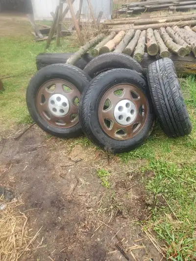 I'm selling a set of four 175/70R14 summer tires, mounted on 3 rims. These tires are used, but they...