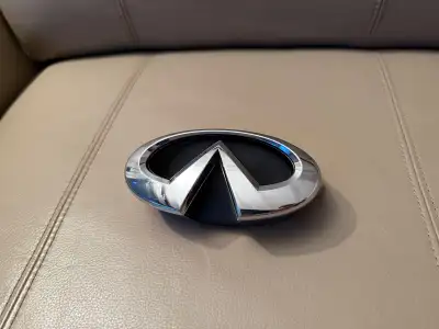 Genuine OEM Infiniti product. In great condition, no major scratches or dents.