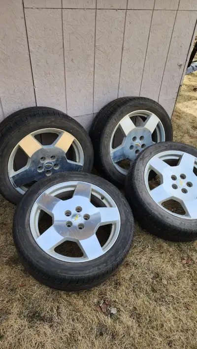 Set of four oem rims with summer tires (on) for 2008 Chev Malibu. 225/50R18 Tires are Cooper.