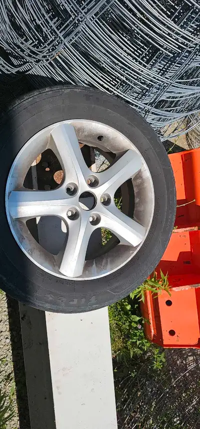 Up for sale is a set of rims with a tires, sized at 205/60R16 92T M+S, perfect as a spare or replace...
