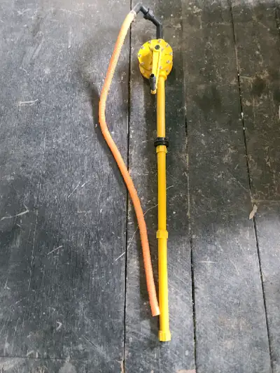 Rotary drum pump Used with one windshield washer fluid barrel
